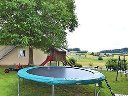 Ferienhaus mit Garten in Waldnahe