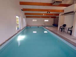 Quaint Holiday Home With Heated Indoor Pool