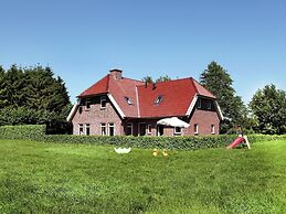 Spacious Farmhouse in Achterhoek With Play Loft
