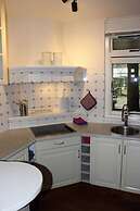 Detached Bungalow With Outdoor Fireplace