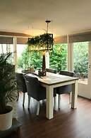 Detached Bungalow With Outdoor Fireplace