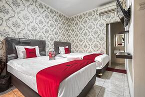 RedDoorz near Tomang 2
