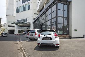 RedDoorz Apartment near Grand City Mall