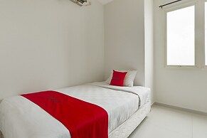 RedDoorz Apartment near Grand City Mall