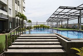 RedDoorz Apartment near Grand City Mall