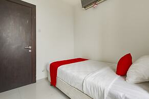 RedDoorz Apartment near Grand City Mall
