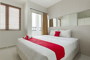 RedDoorz Apartment near Grand City Mall