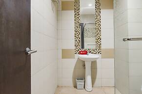 RedDoorz Apartment near Grand City Mall