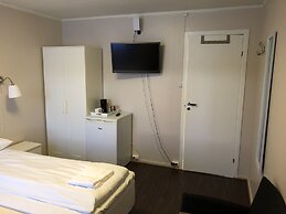 Midnattsol rom og hytter