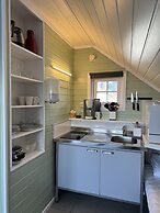 Midnattsol rom og hytter