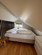 Midnattsol rom og hytter