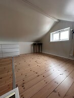 Midnattsol rom og hytter