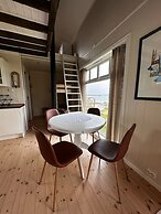 Midnattsol rom og hytter