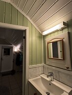 Midnattsol rom og hytter