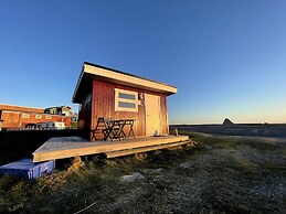 Midnattsol rom og hytter