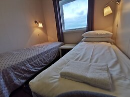 Midnattsol rom og hytter