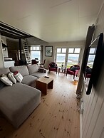 Midnattsol rom og hytter