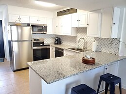 Spanish Trace 240 2 Bedroom Condo by RedAwning