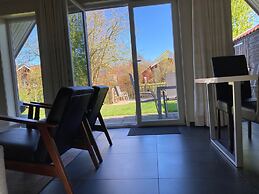 Cozy House Heide 6p at a Canal Near Lake Lauwersmeer