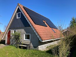 Cozy House Heide 6p at a Canal Near Lake Lauwersmeer