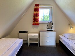 Cozy House Heide 6p at a Canal Near Lake Lauwersmeer