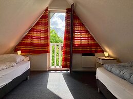 Cozy House Heide 6p at a Canal Near Lake Lauwersmeer