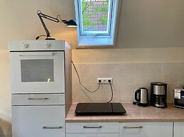 Cozy House Heide 6p at a Canal Near Lake Lauwersmeer