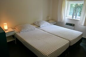 Cozy House Heide 6p at a Canal Near Lake Lauwersmeer