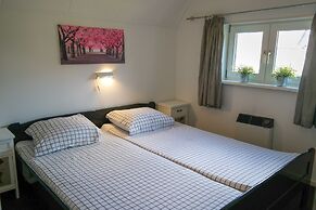 Modern Holiday Home at a Typical Dutch Canal, Close to the Lauwersmeer