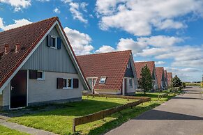 Modern Holiday Home at a Typical Dutch Canal, Close to the Lauwersmeer