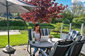 Modern Holiday Home at a Typical Dutch Canal, Close to the Lauwersmeer