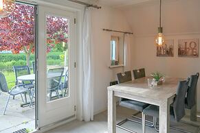 Modern Holiday Home at a Typical Dutch Canal, Close to the Lauwersmeer
