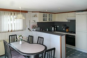 6 Pers - Chalet Emma Located at the Lauwersmeer With own Fishing Pier