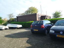 6 Pers - Chalet Emma Located at the Lauwersmeer With own Fishing Pier