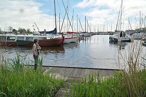 6 Pers - Chalet Emma Located at the Lauwersmeer With own Fishing Pier