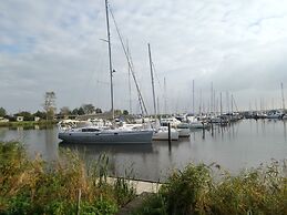 6 Pers - Chalet Emma Located at the Lauwersmeer With own Fishing Pier