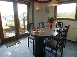 6 Pers - Chalet Emma Located at the Lauwersmeer With own Fishing Pier