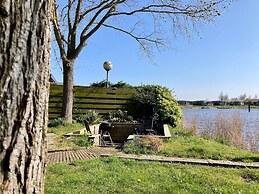 2 Pers - House König Lakeside of the Lauwersmeer With own Fishing Pier
