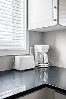 GLOBALSTAY. Modern Lake Ontario Townhomes