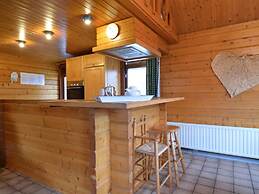 A Wooden Chalet Located in a Quiet and Green