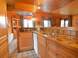 A Wooden Chalet Located in a Quiet and Green