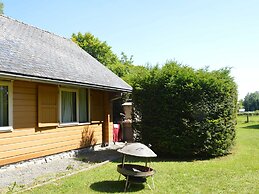 A Wooden Chalet Located in a Quiet and Green