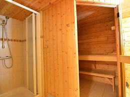 A Wooden Chalet Located in a Quiet and Green