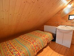 A Wooden Chalet Located in a Quiet and Green