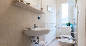 JOIVY Cozy Flat for 4 w/ Patio, Nearby Navigli