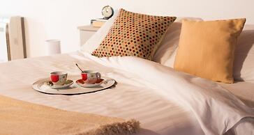 JOIVY Scenic 2BR Apt w/ Balcony & Parking