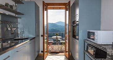 JOIVY Scenic 2BR Apt w/ Balcony & Parking