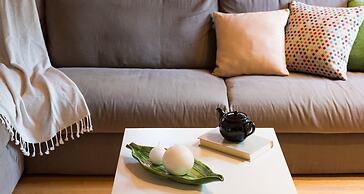 JOIVY Scenic 2BR Apt w/ Balcony & Parking