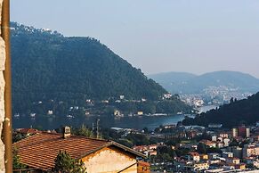 JOIVY Scenic 2BR Apt w/ Balcony & Parking