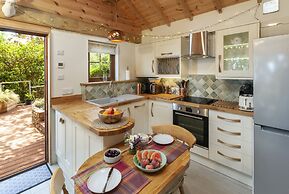 Porthole Log Cabin